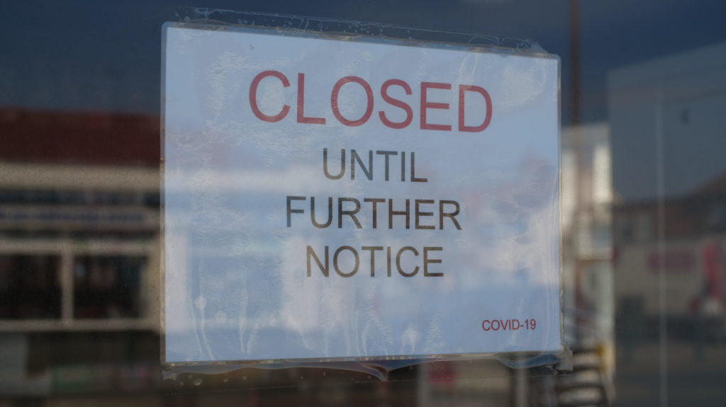 Sign indicating that the business has closed.